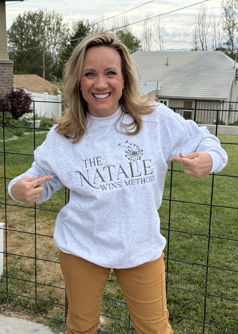 Natalie Winslow-Devey wearing The Natalie Wins Method sweatshirt sent by a happy customer